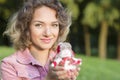 Woman portrait with a Christmas toy. Royalty Free Stock Photo