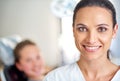 Woman, portrait and dentist for oral care in office, smile and ready for consultation on hygiene. Female person Royalty Free Stock Photo