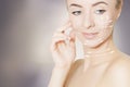 Gorgeous woman portrait cleaning skin