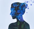 Woman portrait with double exposure and with flowers of blue lilac closeup Royalty Free Stock Photo