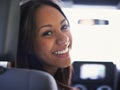 Woman, portrait and driving in car for road trip, travel and happy on journey with transportation. Face of a young Royalty Free Stock Photo