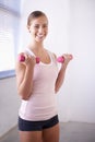 Woman, portrait and dumbbell for weight training in home with exercise, smile and workout. Happy, wellness and gym Royalty Free Stock Photo