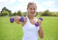 Woman, portrait and dumbbells, weightlifting for exercise and muscle, athlete outdoor for sport and bodybuilding