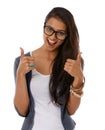 Woman, portrait and excited with thumbs up in studio for thank you, support and hand gesture with glasses. Person, yes Royalty Free Stock Photo