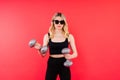 Woman, portrait and fitness, sunglasses and dumbbells, retro fashion accessory and muscle training. Royalty Free Stock Photo