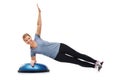 Woman portrait, half ball or plank for fitness, studio workout or core strength development. Balance challenge, exercise Royalty Free Stock Photo