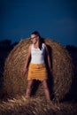 Woman portrait with hay in nature