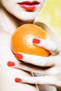 Woman Portrait holding a mandarin orange tangerine