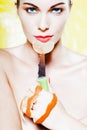 Woman Portrait holding a orange tangerine fruit slice Royalty Free Stock Photo