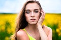 Woman portrait outdoors on the flower field