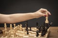 Woman portrait of playing on fine wooden chess board Royalty Free Stock Photo