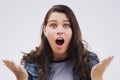 Woman, portrait and shock in studio for news, gossip and wtf or omg for sale on white background. Female person