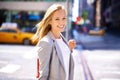 Woman, portrait and smile with city, commute and walk for work or career. Designer, job and new york street with urban Royalty Free Stock Photo