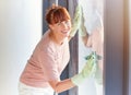 Woman, portrait smile and cleaning window for housekeeping, services or disinfection. Happy female cleaner smiling and Royalty Free Stock Photo