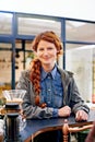 Woman, portrait and smile in morning at a coffee shop for drink, relax and order at diner for latte. Girl, person or Royalty Free Stock Photo