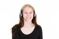 Woman portrait of smiling cheerful young support phone operator in headset isolated over white background Royalty Free Stock Photo