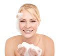 Woman, portrait and soap on face for skincare with glycerine, peptides and foam for clear skin. Female person, white Royalty Free Stock Photo