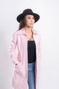 Woman portrait in a trendy pink coat Royalty Free Stock Photo