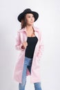 Woman portrait in a trendy pink coat Royalty Free Stock Photo