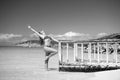 Woman pose at sea pier in st johns, antigua Royalty Free Stock Photo