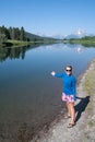 Woman poses along the Snake River at Oxbow Bend in Grand Teton National Park Wyoming Royalty Free Stock Photo