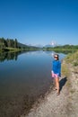 Woman poses along the Snake River at Oxbow Bend in Grand Teton National Park Wyoming Royalty Free Stock Photo