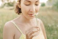 Woman poses with a single Daisy as a symbol of purity Royalty Free Stock Photo