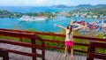 The woman posing against port or cruise dock at Saint Lucia island Royalty Free Stock Photo