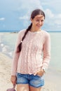 Woman posing against the sea Royalty Free Stock Photo