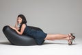 Woman posing on beanbag