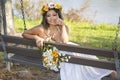 Woman Posing Casually On A Swing