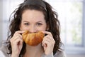 Woman posing with croissant Royalty Free Stock Photo