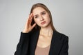 Woman Posing With Hands on Face against gray background Royalty Free Stock Photo