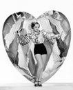 Woman posing with large heart