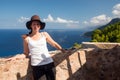 Woman posing on lookout by the Torre des Verger, Mallorca Royalty Free Stock Photo