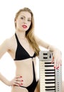 Woman posing with Piano keyboard. Royalty Free Stock Photo