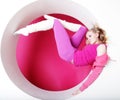 Woman posing in pink circle