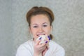 Woman posing with a rat. Beautiful girl holding a mouse in her hands Royalty Free Stock Photo