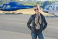 Woman posing in tarmac