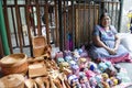 Woman posing with typical handicraft