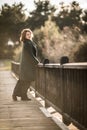 Woman Posing on a Wooden Old Bridge Royalty Free Stock Photo