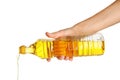 Woman pouring cooking oil from bottle on background, closeup