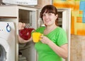 Woman pouring cool fruit-drink