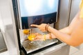 Woman pouring fresh juice in a glass Royalty Free Stock Photo