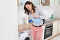 Woman Pouring Liquid Detergent In The Bottle Cap Royalty Free Stock Photo