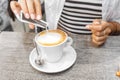 Woman pouring sugar and preparing hot coffee cup Royalty Free Stock Photo
