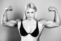 Woman power. Girl with drawn hands powerful. Young fit model. Strong and confident woman flexing her muscle. Woman Royalty Free Stock Photo