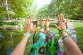 woman practice yoga outdoor stretching the arms and legs and balance first person POV