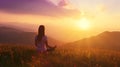 Woman practices yoga and meditates on mountain