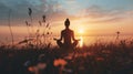 Woman practices yoga and meditates on the nature Royalty Free Stock Photo